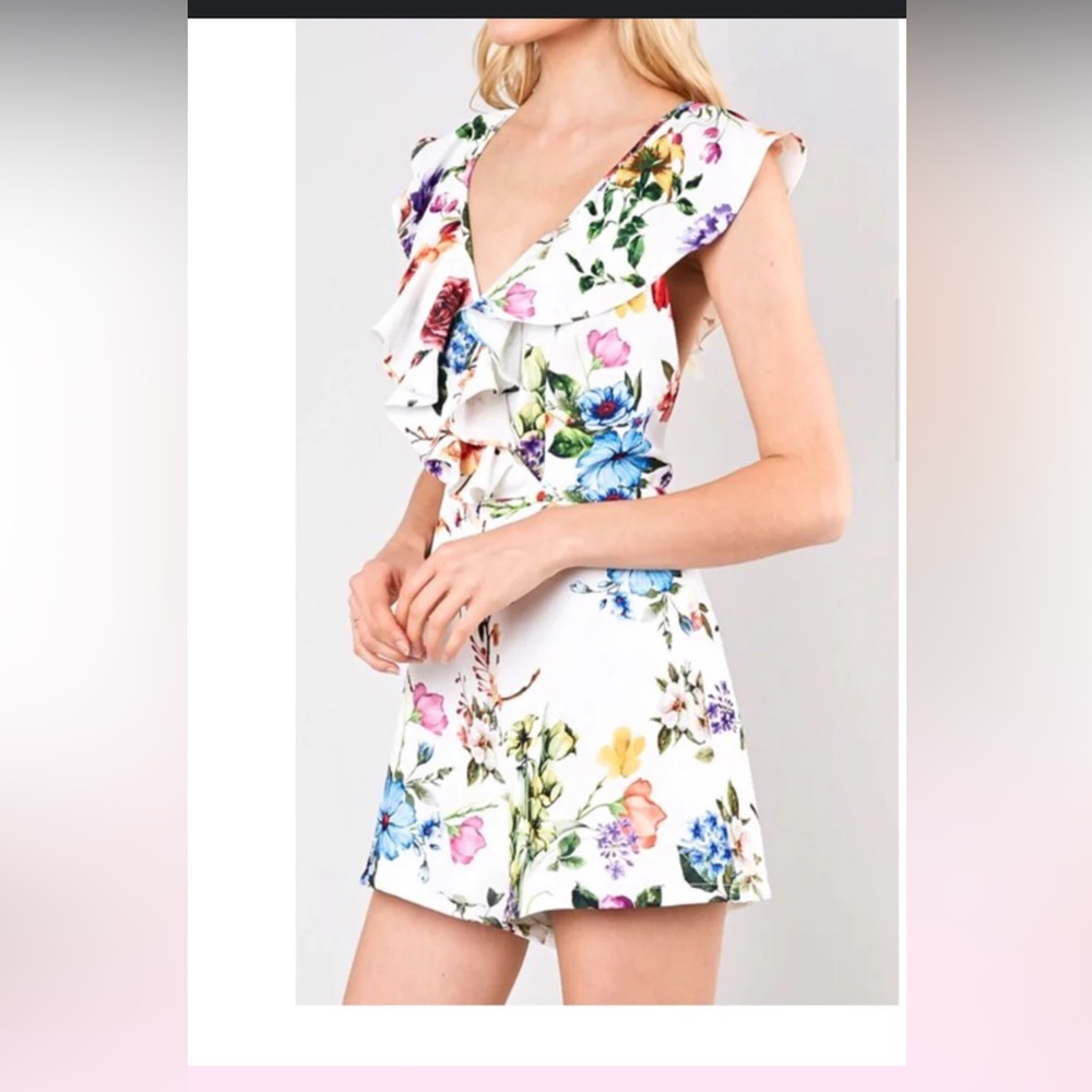 Romper size small new without tags . So so cute